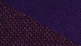 Fabric swatch dyed in eggplant purple, demonstrating the vibrant color achieved with our fabric dye on different textures.