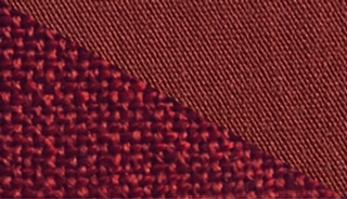 Fabric swatch dyed in cherry red, demonstrating the vibrant color achieved with our dye on different fabrics